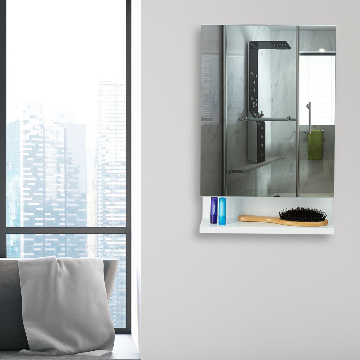 Bathroom mirror cabinet with outlet