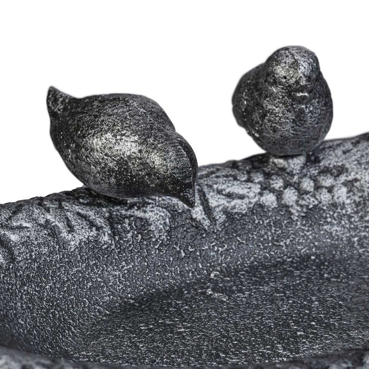 Cast iron bird bath with birds