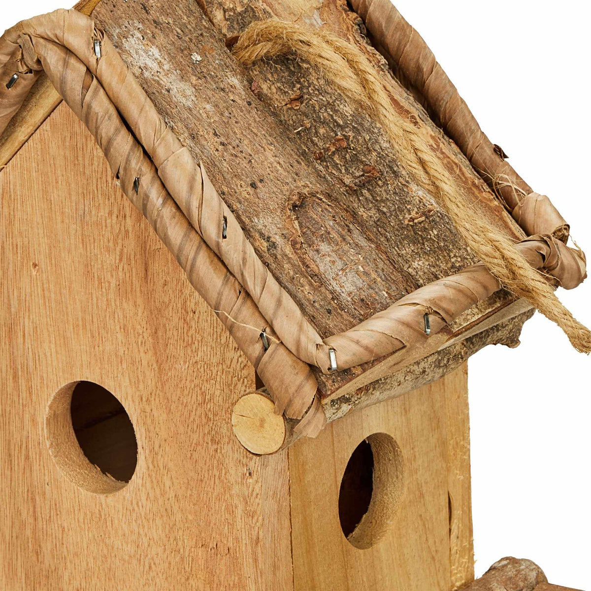 Decorative bird house with feeding station
