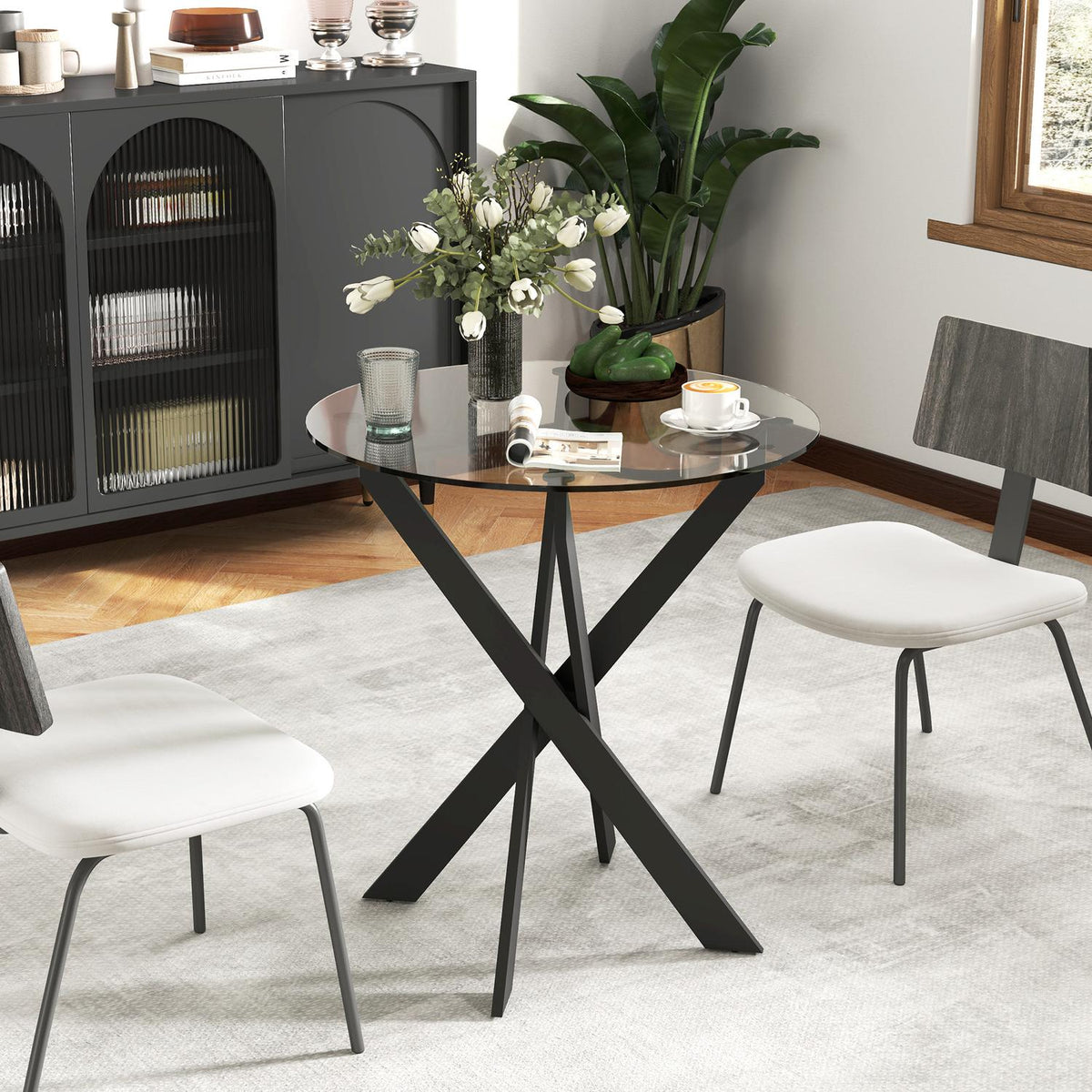 Dining table, round kitchen table for 4 people, dining room table with steel legs, table top made of tempered glass, for dining room, kitchen, Ø70 x 75 cm, modern design, black+transparent
