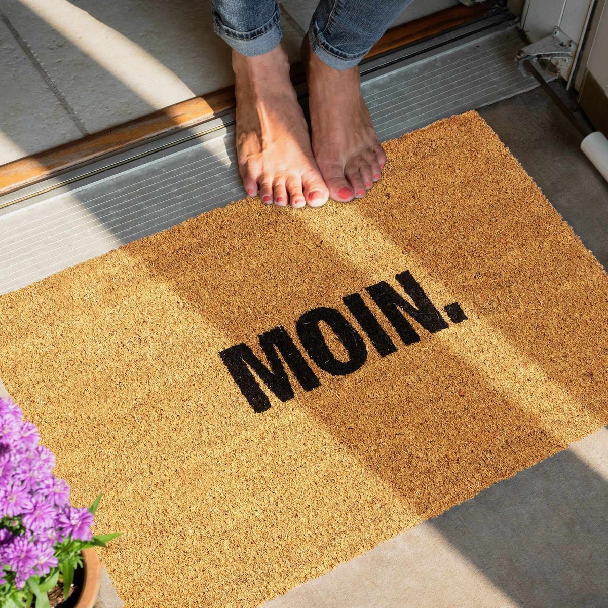 Door mat in coconut "Moin."
