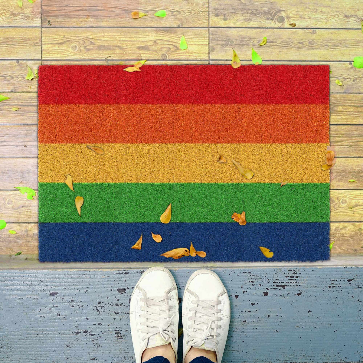 Door mat made of coconut in rainbows