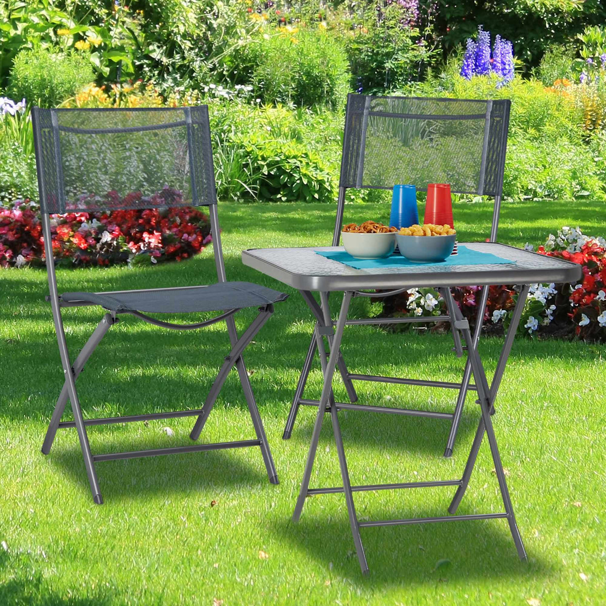 Folding garden table with glass top