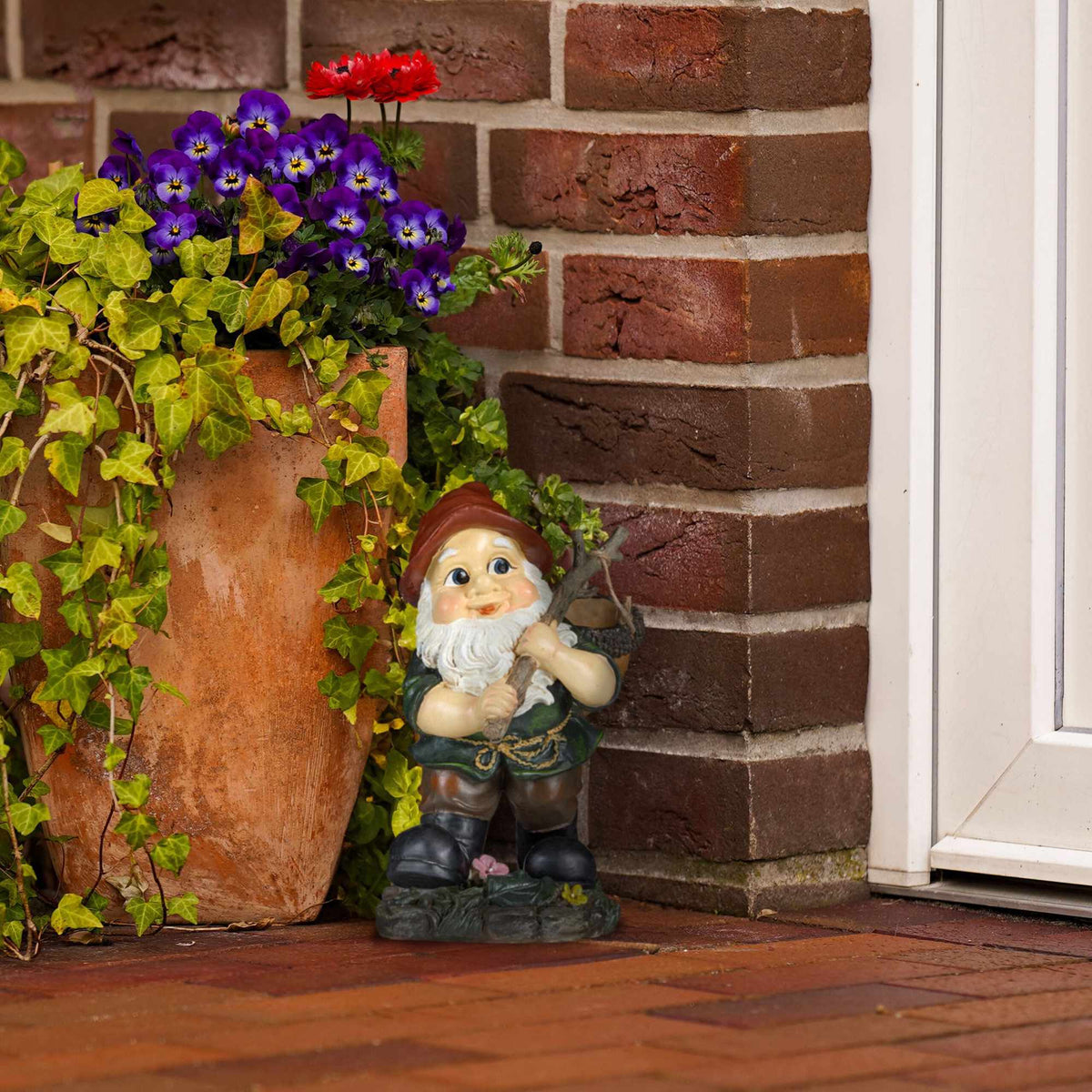 Garden gnome with acorn basket
