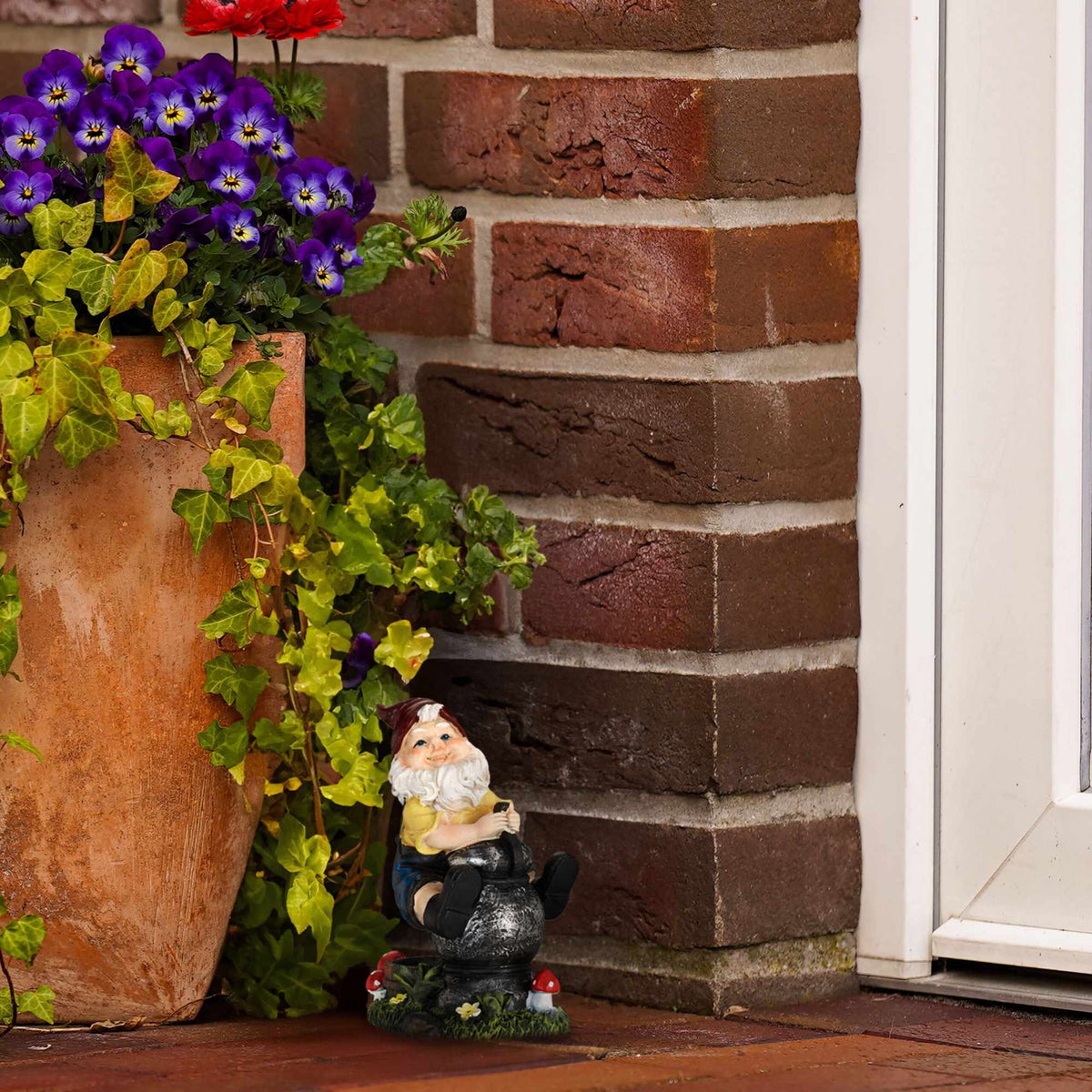 Garden gnome with lantern