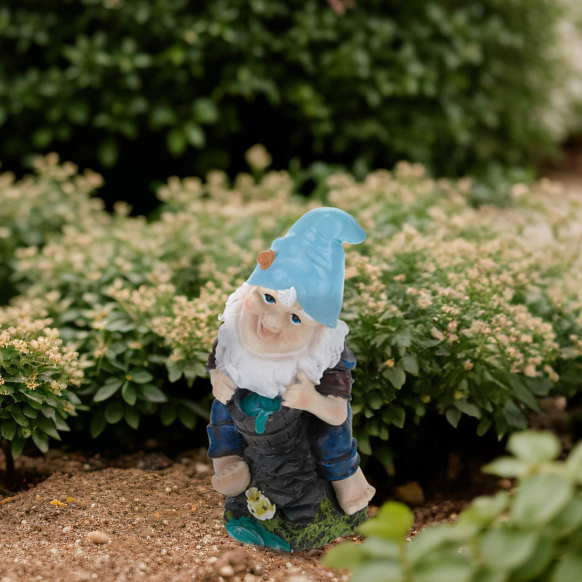 Garden gnome with water bucket