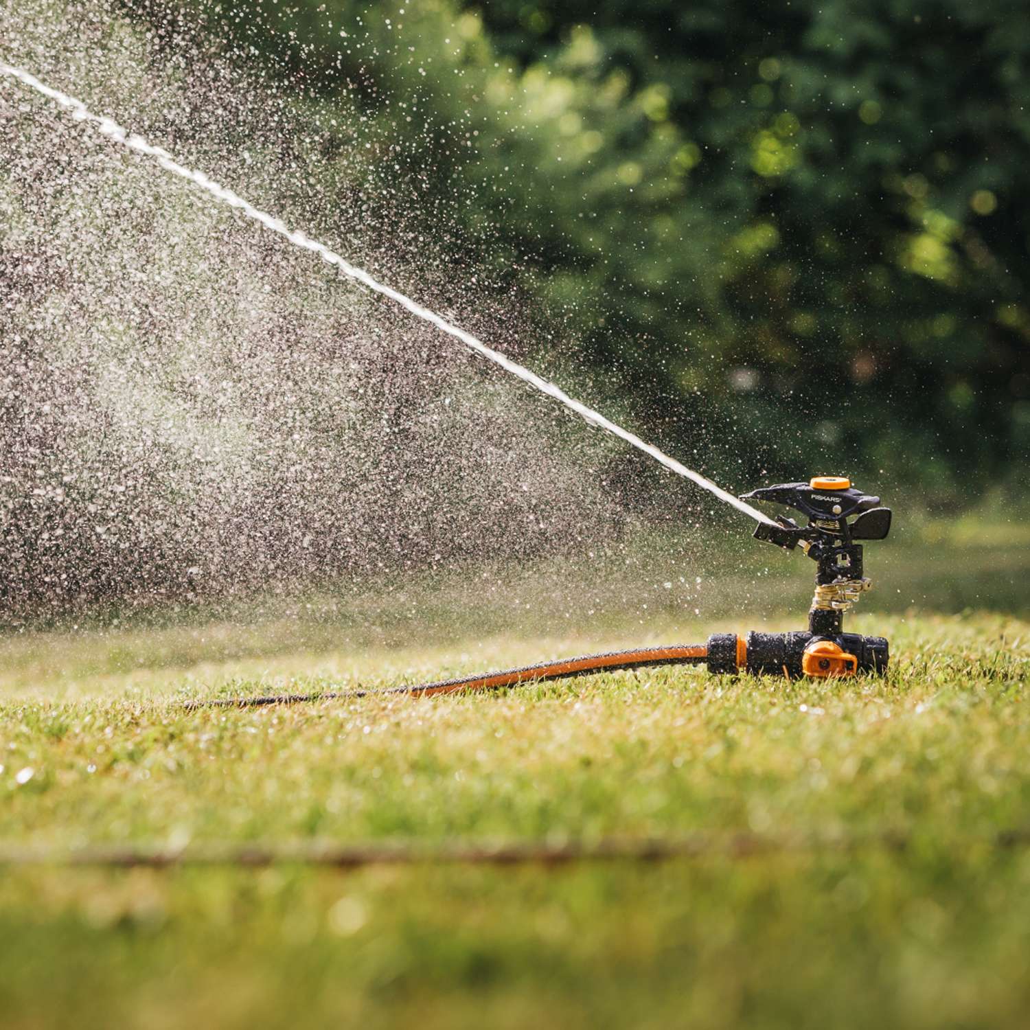 Impulse spreader with ground spike
