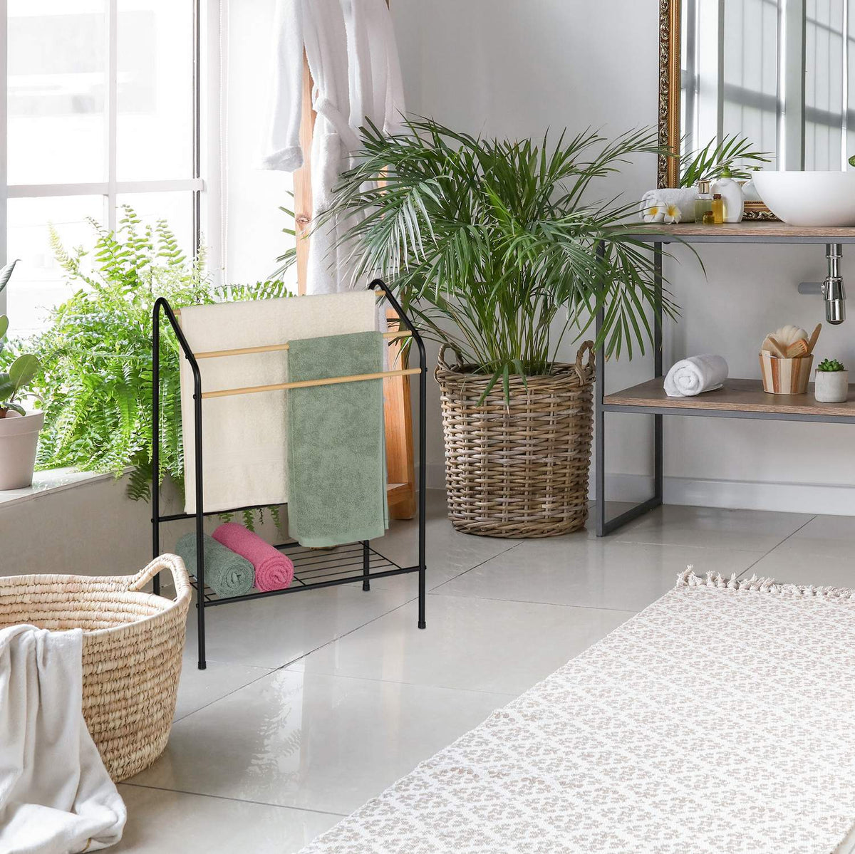 Metal towel rail with shelf