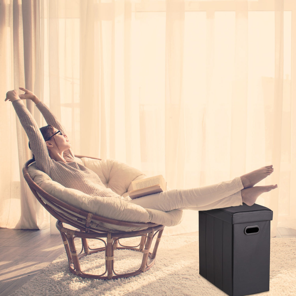 Ottoman in black artificial leather