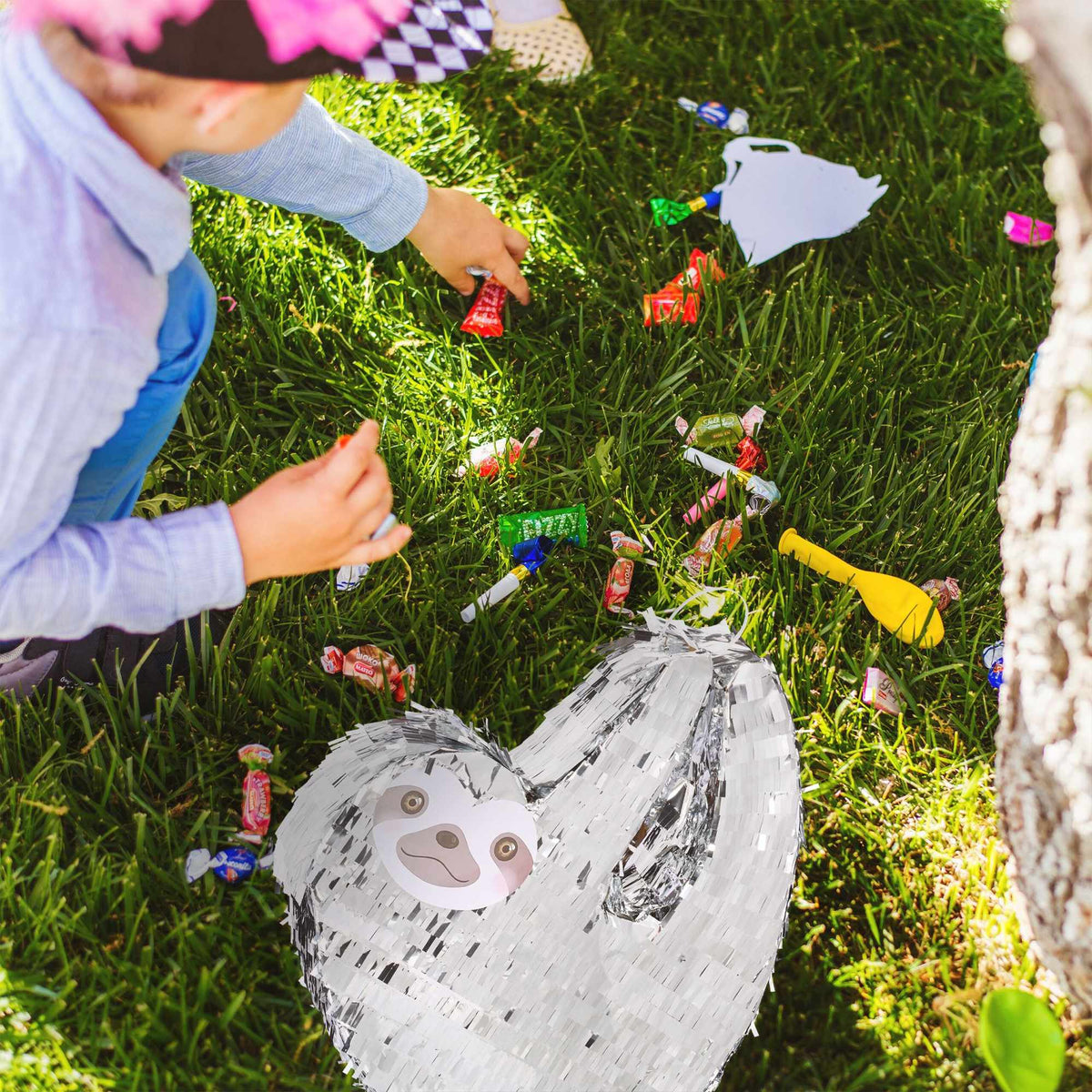 Pinata sloth with club and mask