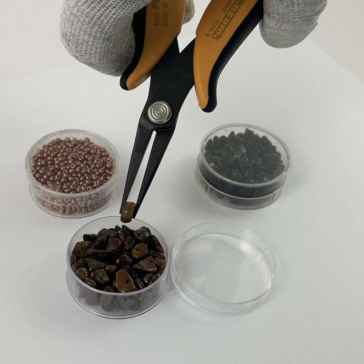 Pliers with long serrated jaws