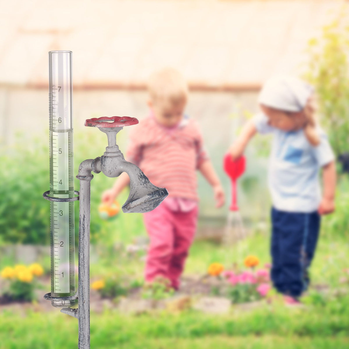 Rain gauge water faucet