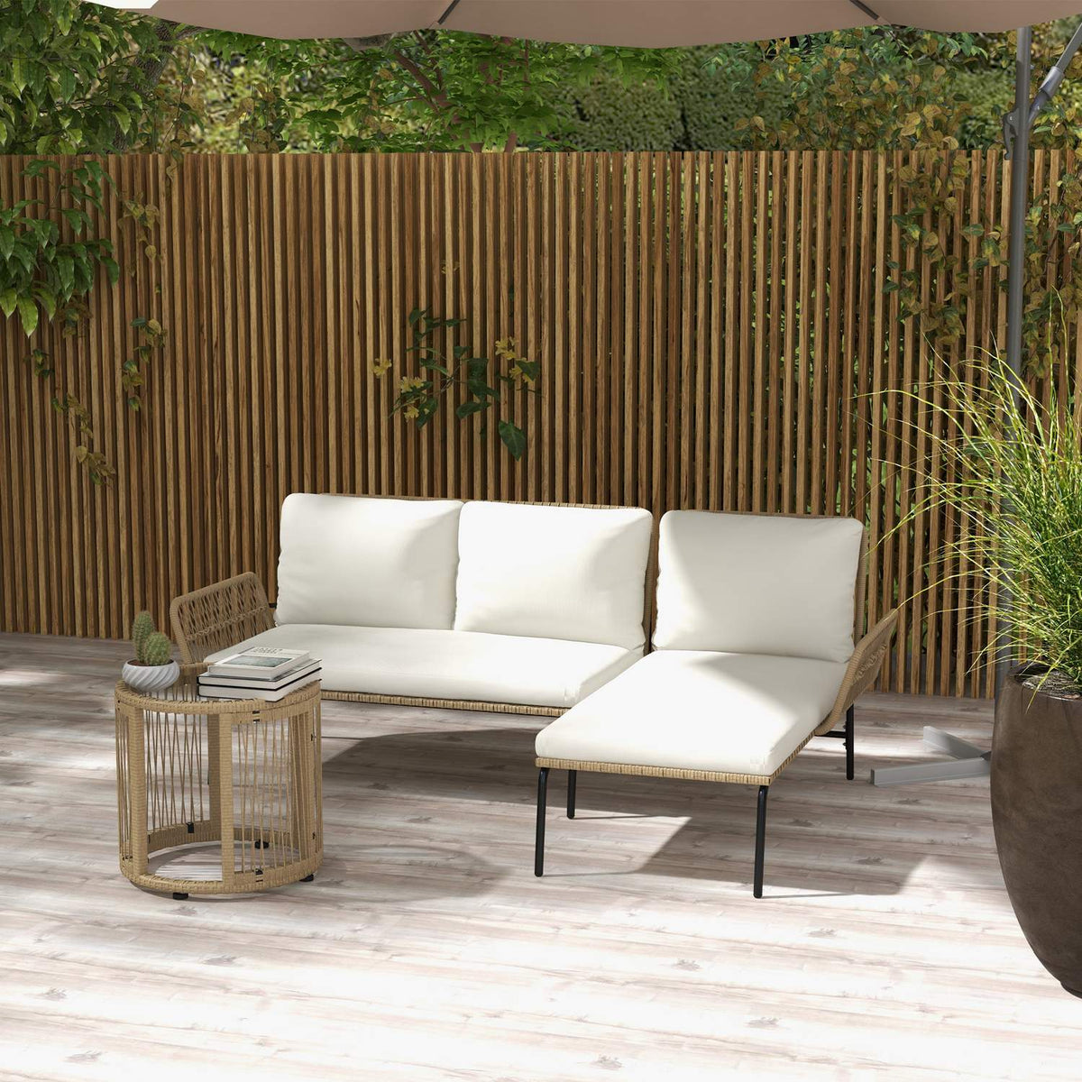 Rattan garden furniture set with deck chair, coffee table, two-seater and cream seat cushion for terrace and balcony