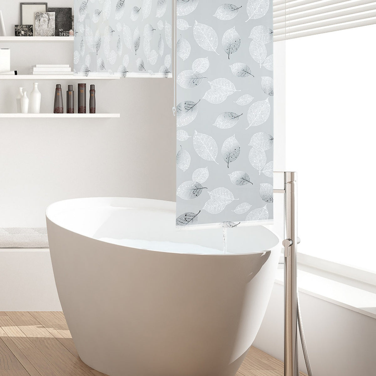 Roller blind for shower with leaf design
