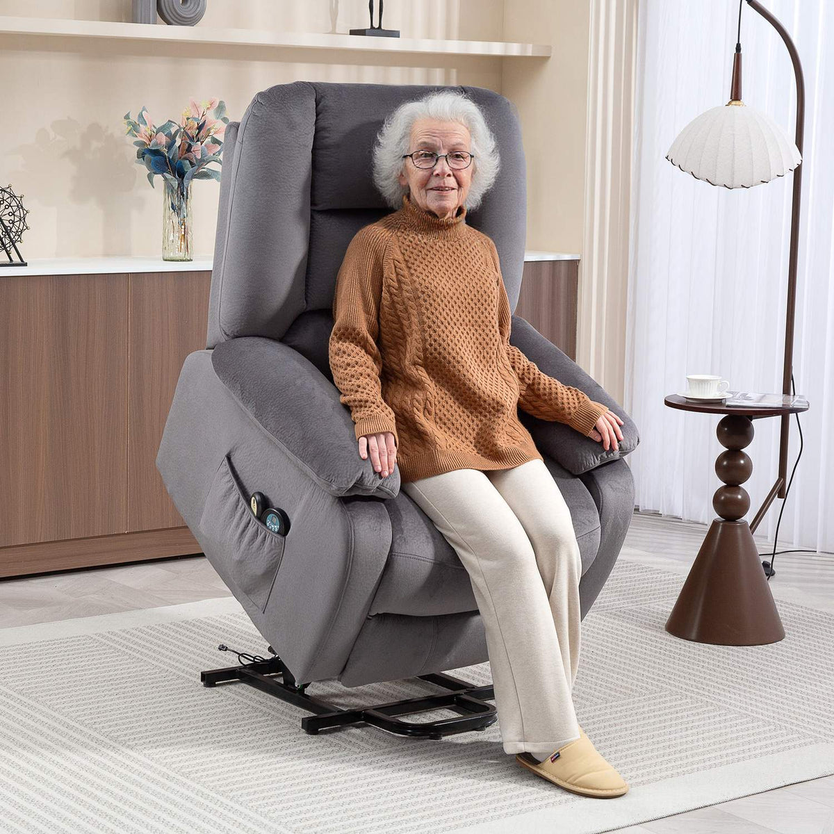 TV chair with stand-up aid, heat and massage function, remote control and side pocket, dark grey