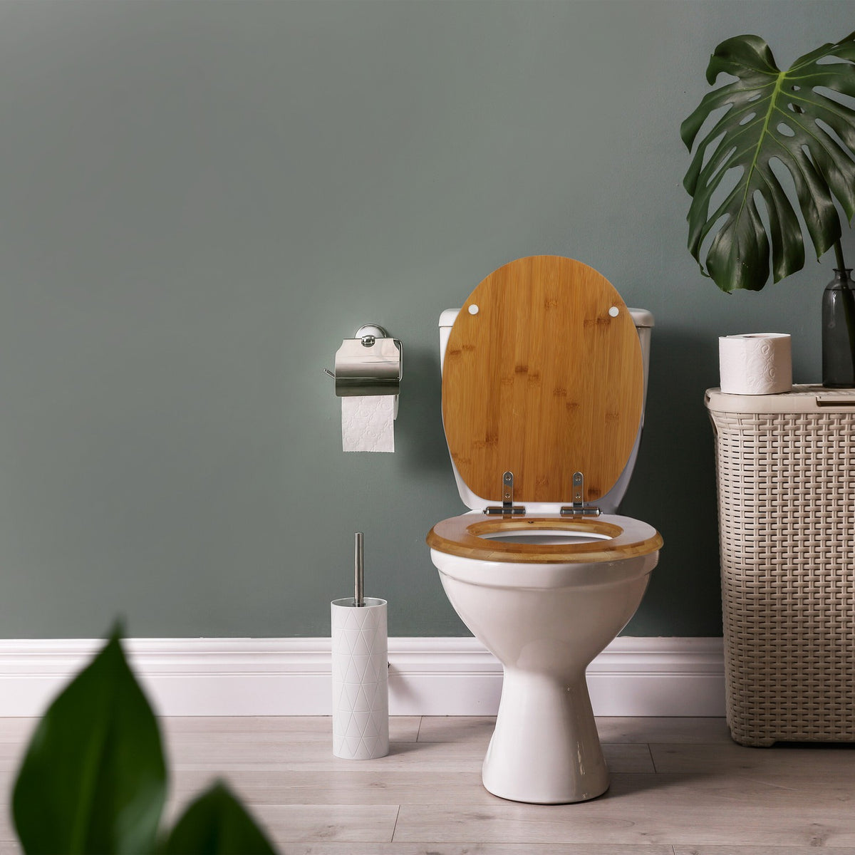 Toilet lid with soft-closing mechanism
