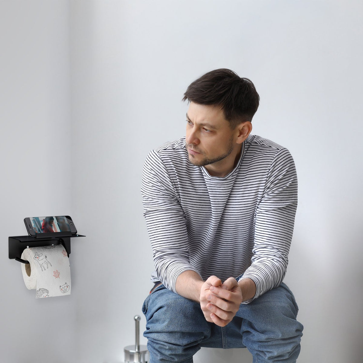 Toilet paper holder with shelf