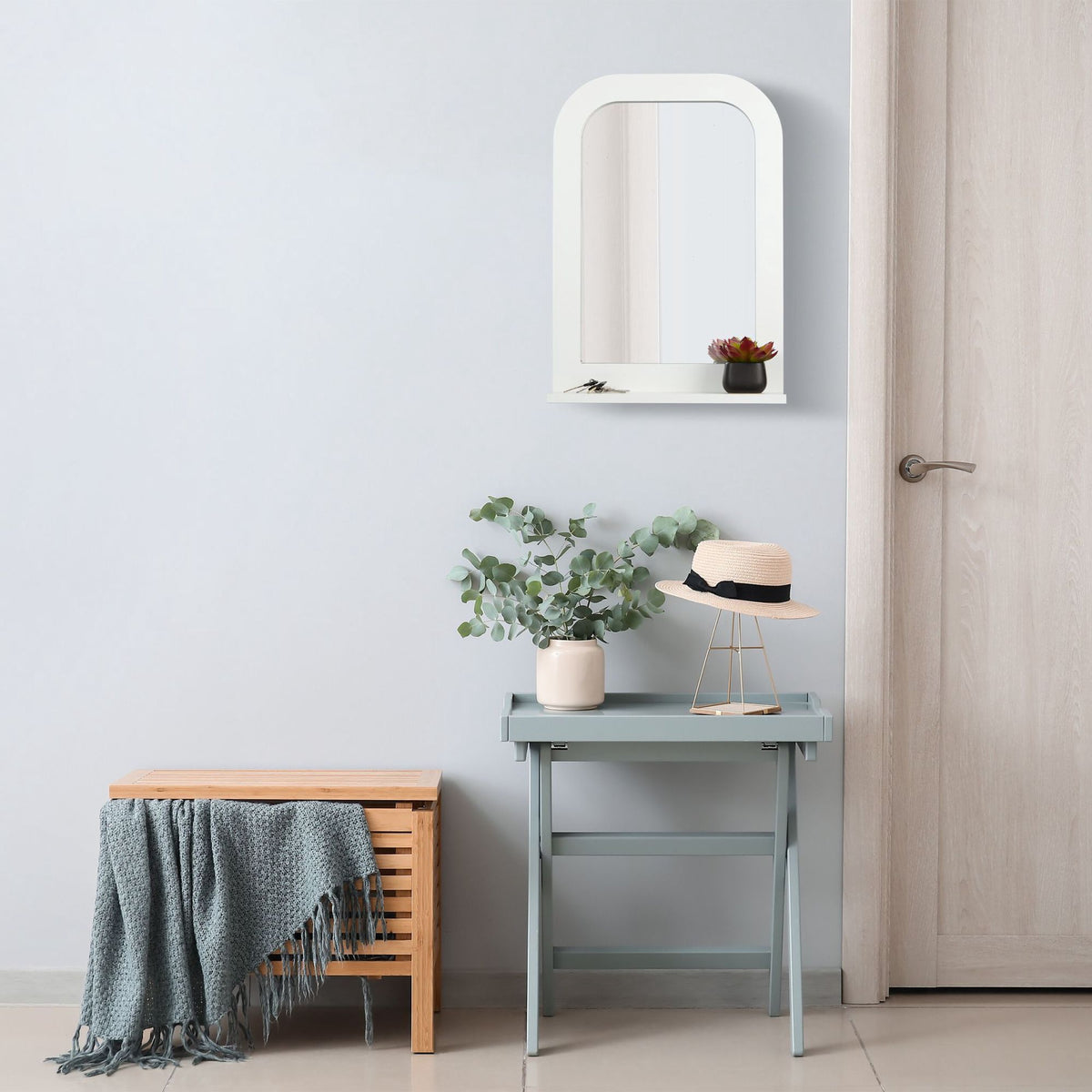 White bathroom mirror with shelf
