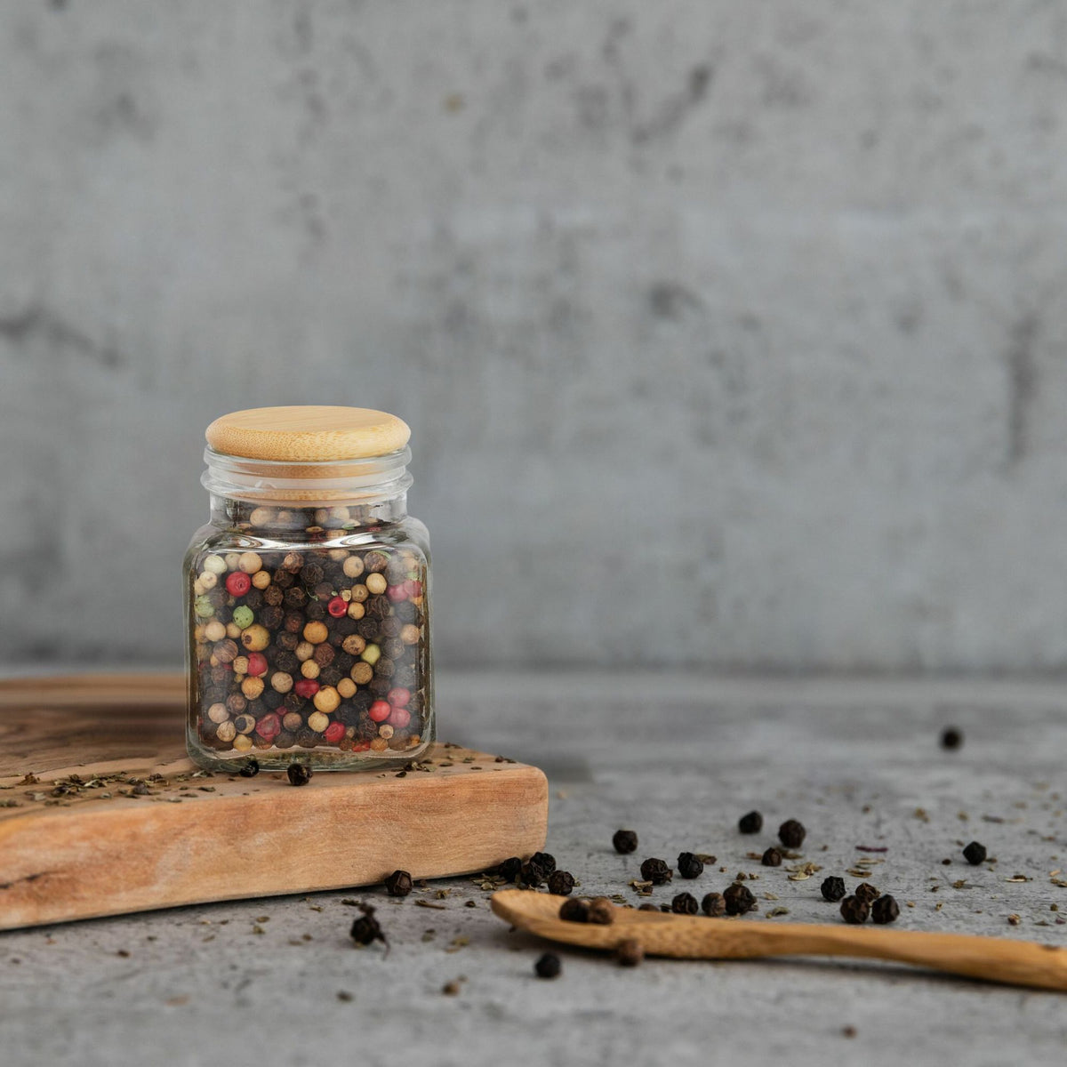 set of 12 spice jars with bamboo lids