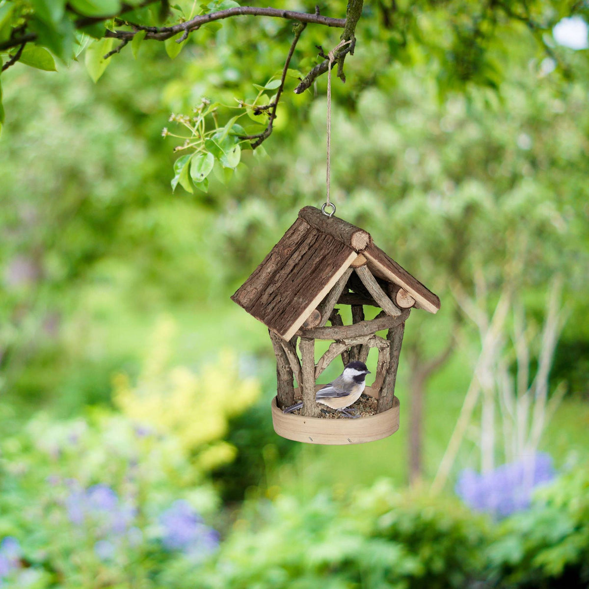 Bird feeding station for outdoors