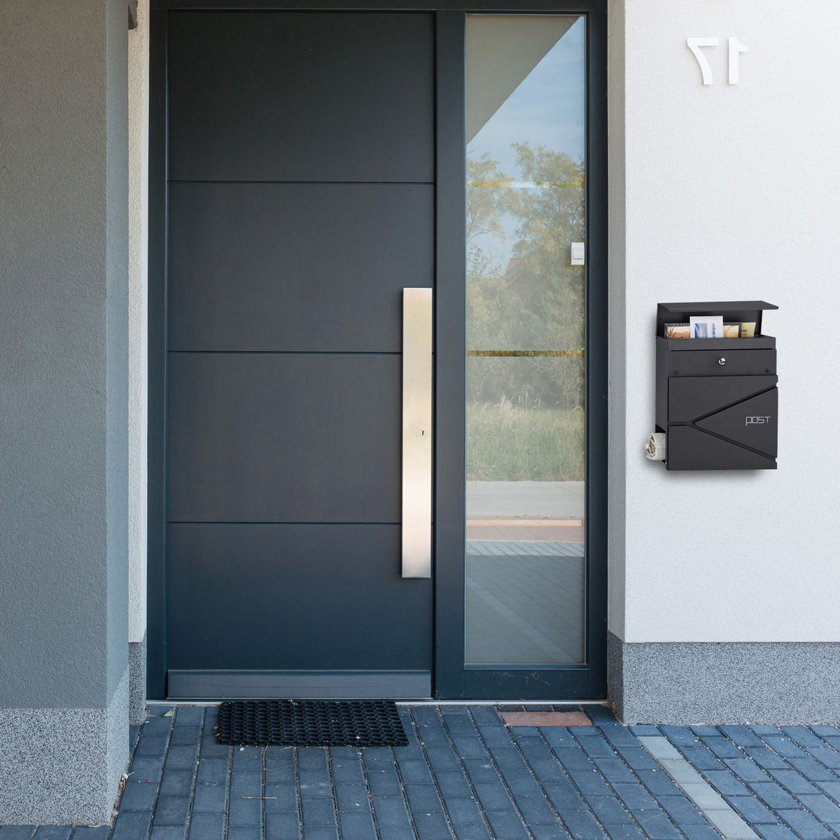 Black mailbox with newspaper holder