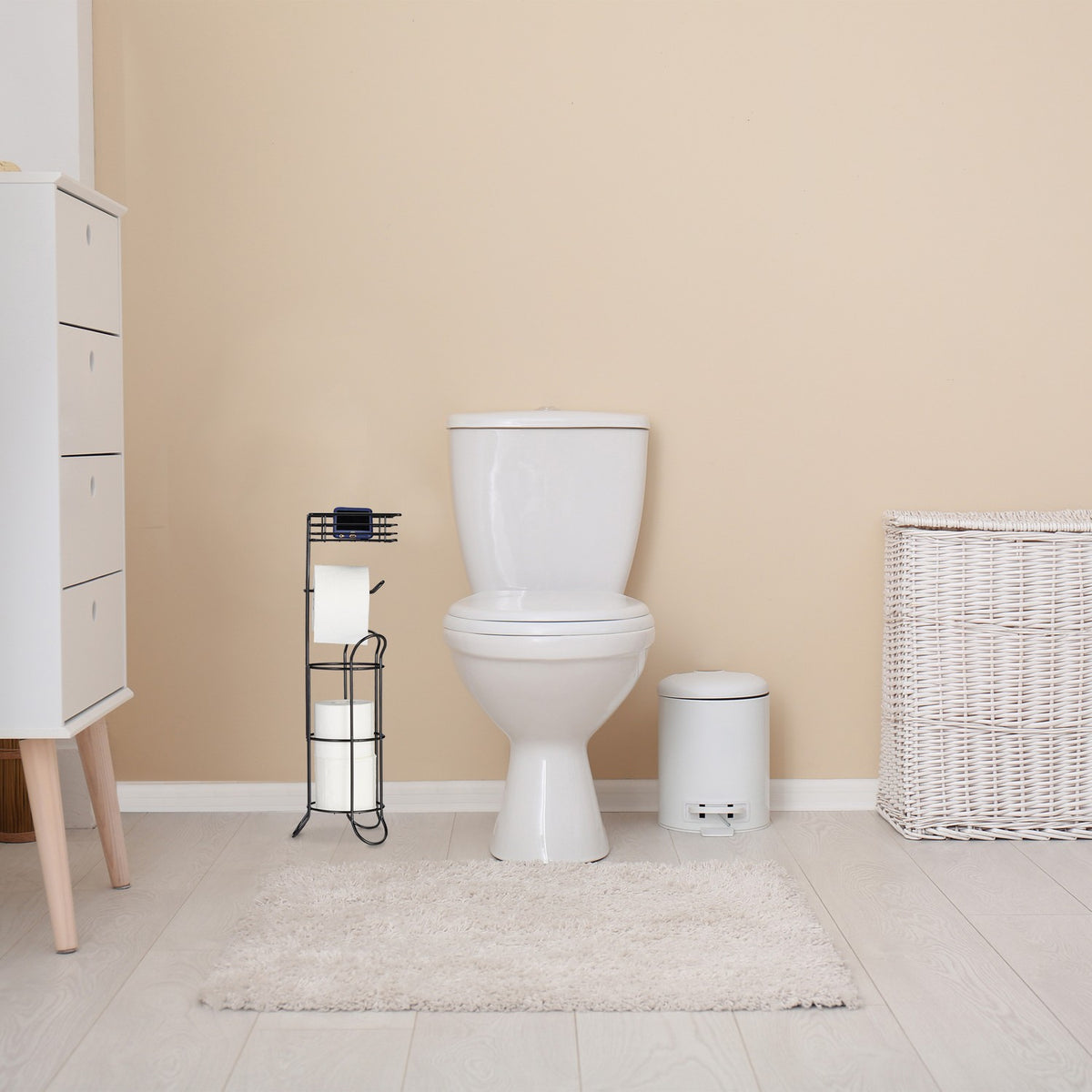 Black toilet paper holder standing