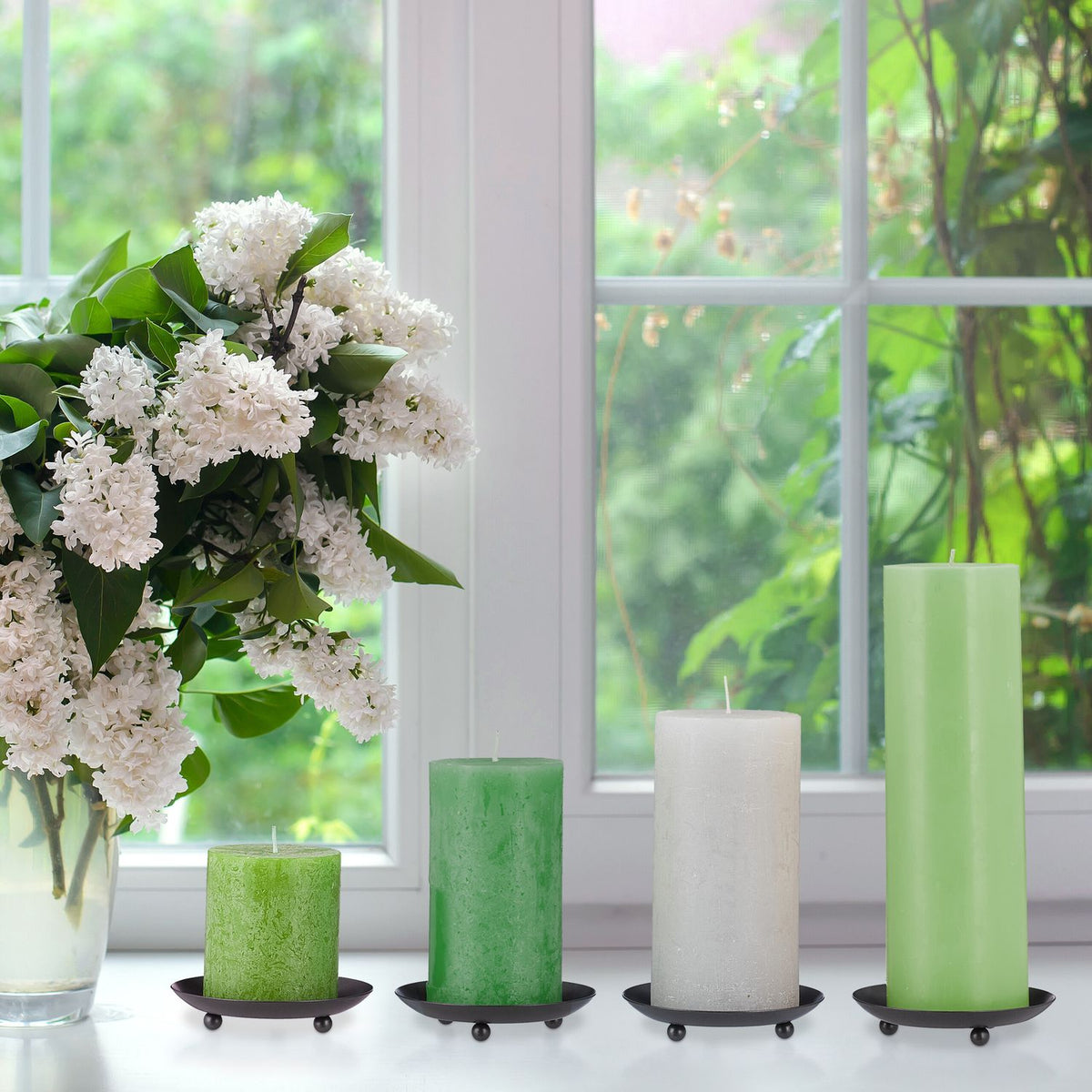 Candlesticks with pillar candles, 4 pcs