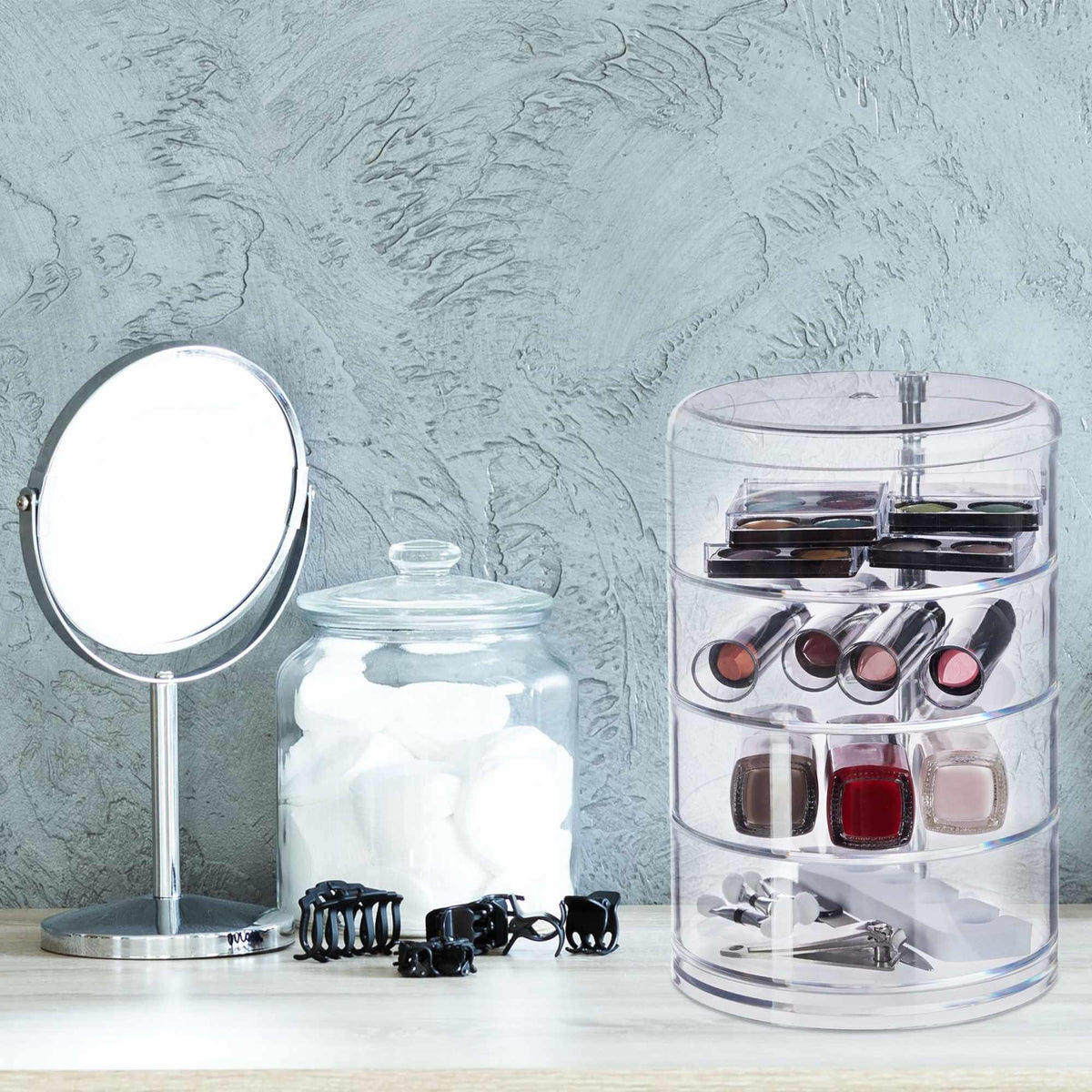 Cosmetic holder with rotating compartment