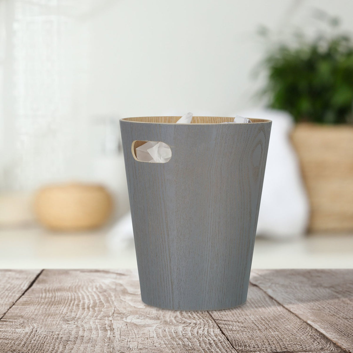 Dark gray wooden wastebasket
