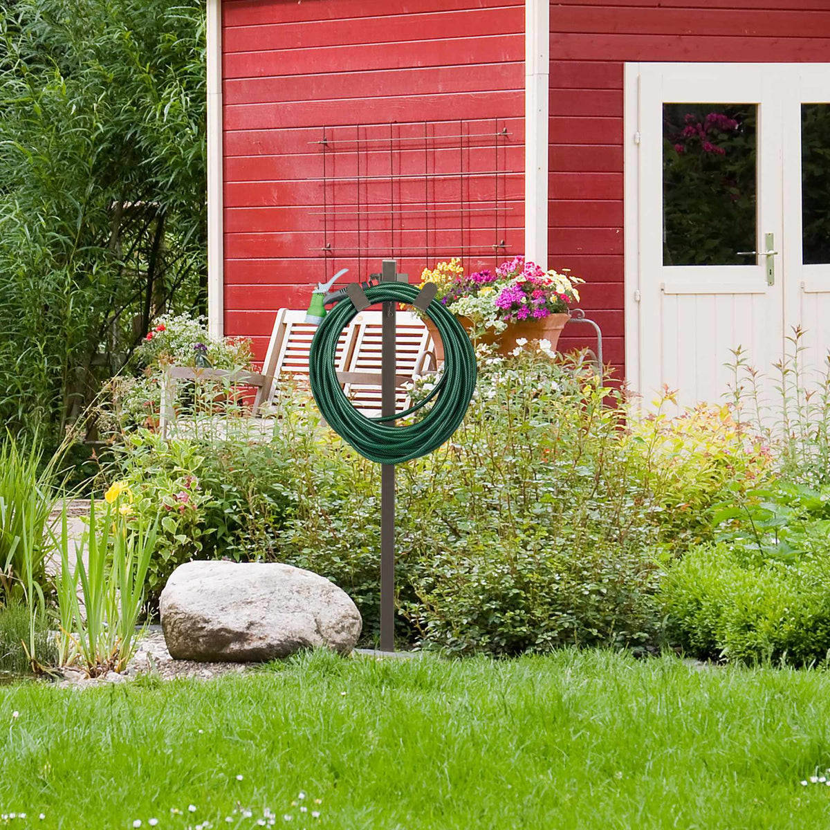 Freestanding hose holder