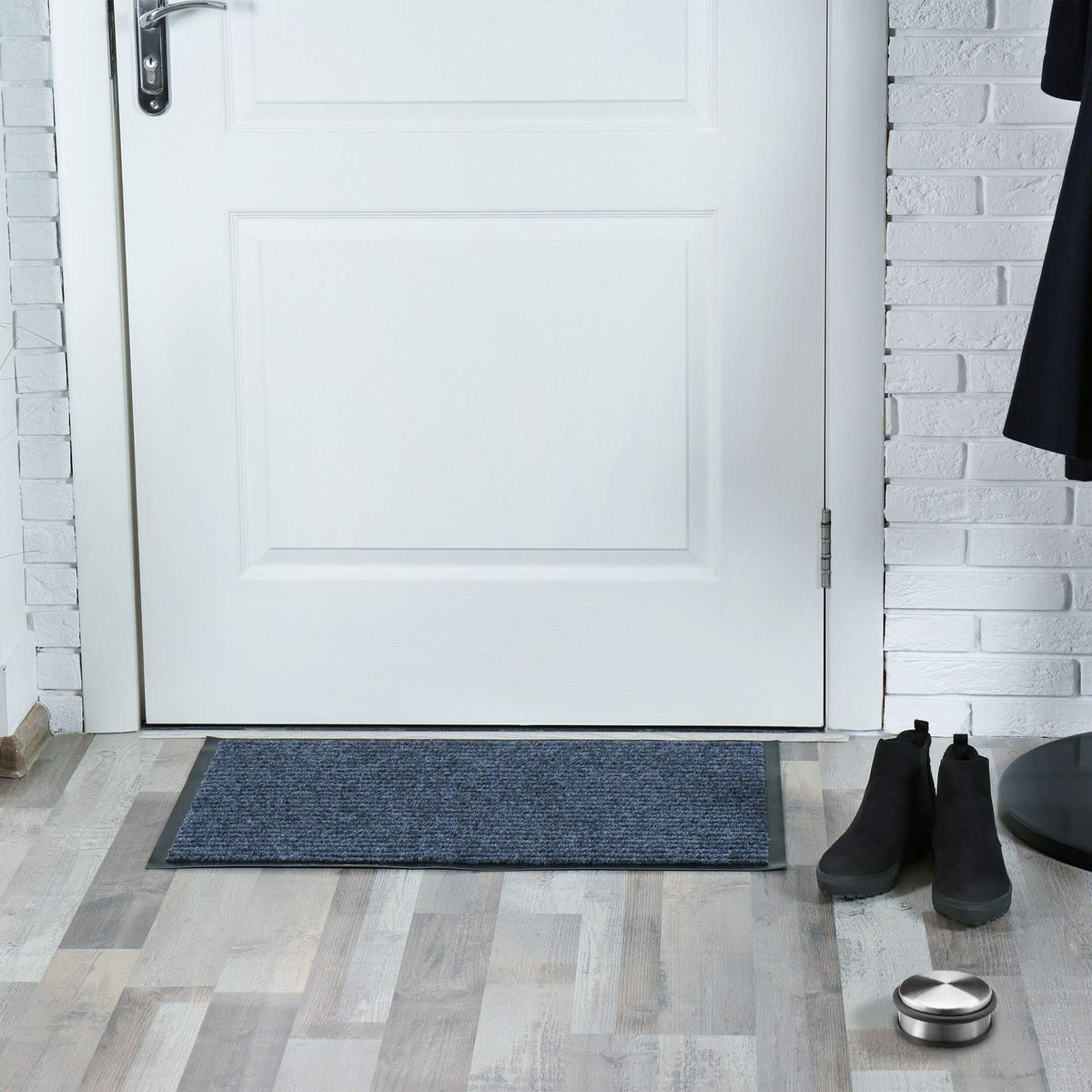 Freestanding stainless steel door stop