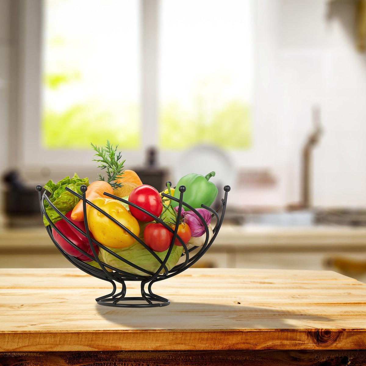 Fruit bowl in black metal