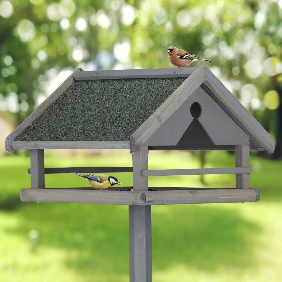 Gray bird table on post