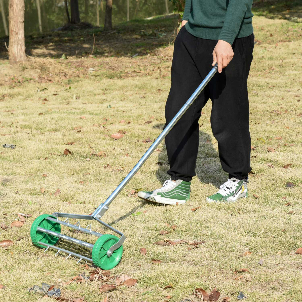 Lawn aerator, handle length, adjustable hand scarifier, lawn aeration, spiked roller lawn, rolling lawn aerator, maintain garden