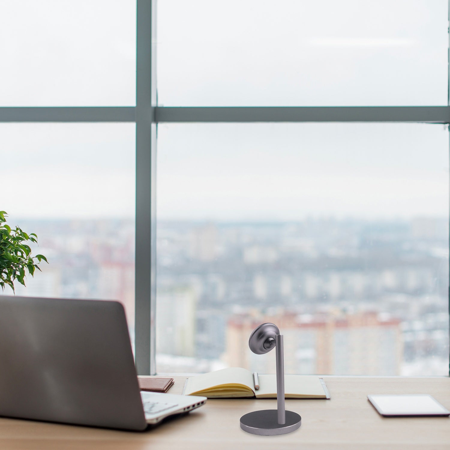 Magnetic holder for tables