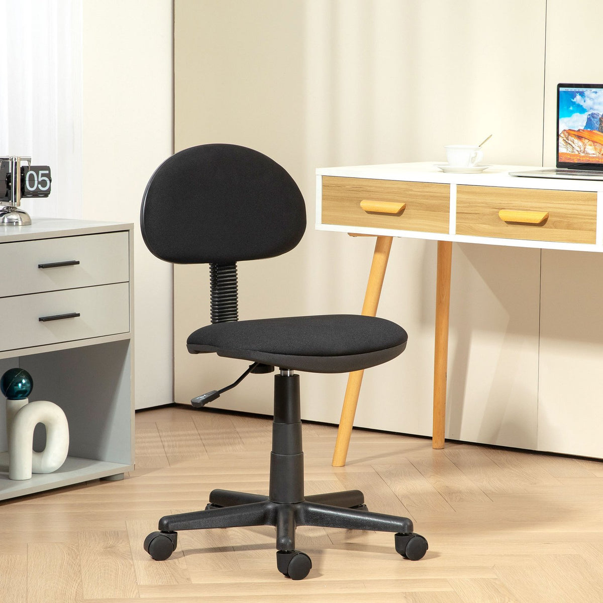 Office chair, armless design, low back, rollable, swivel, black