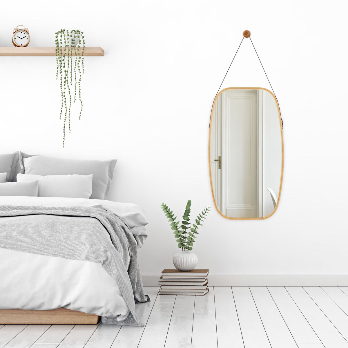 Oval mirror with strap