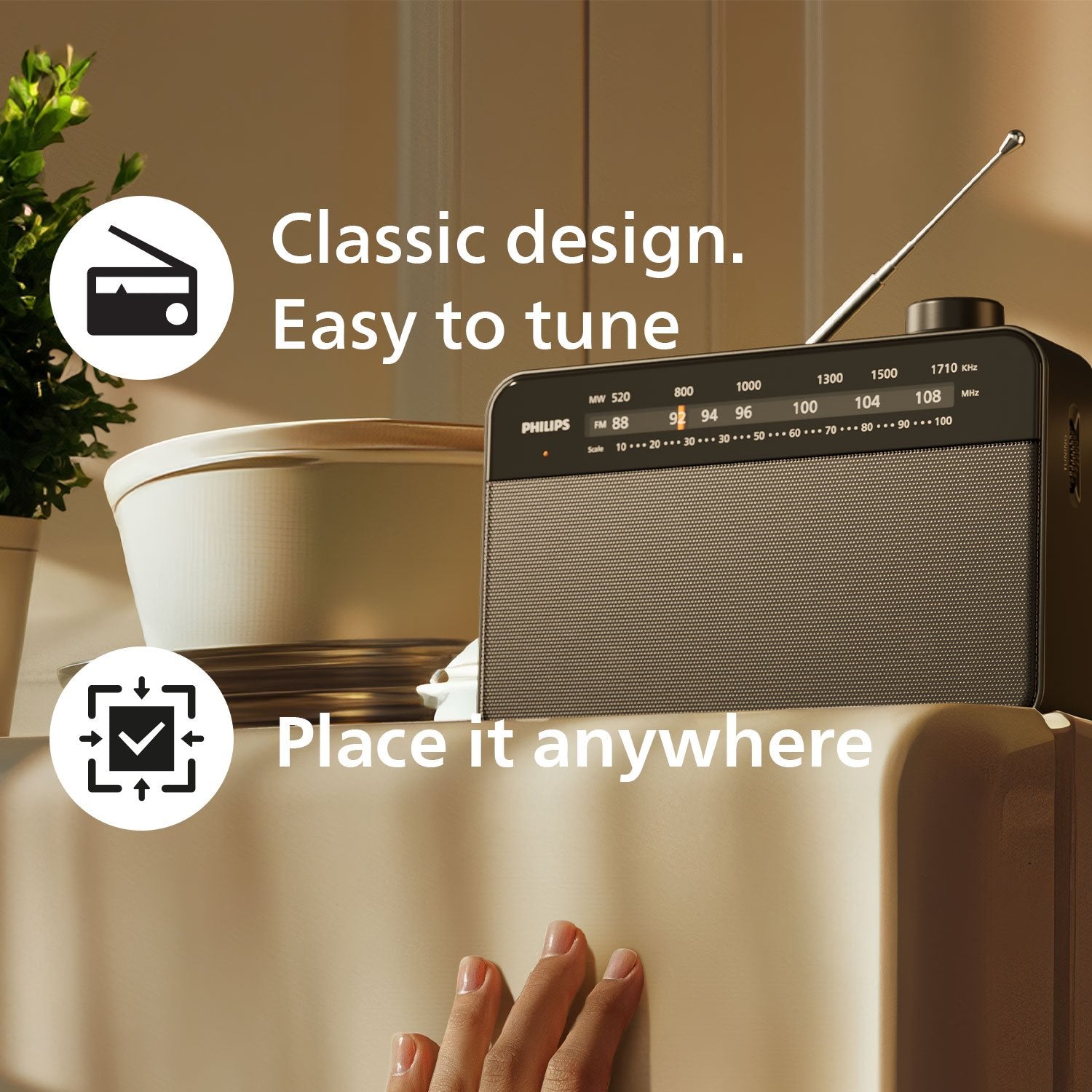 Portable analog FM/MW radio TAR2509. Mains or battery powered.