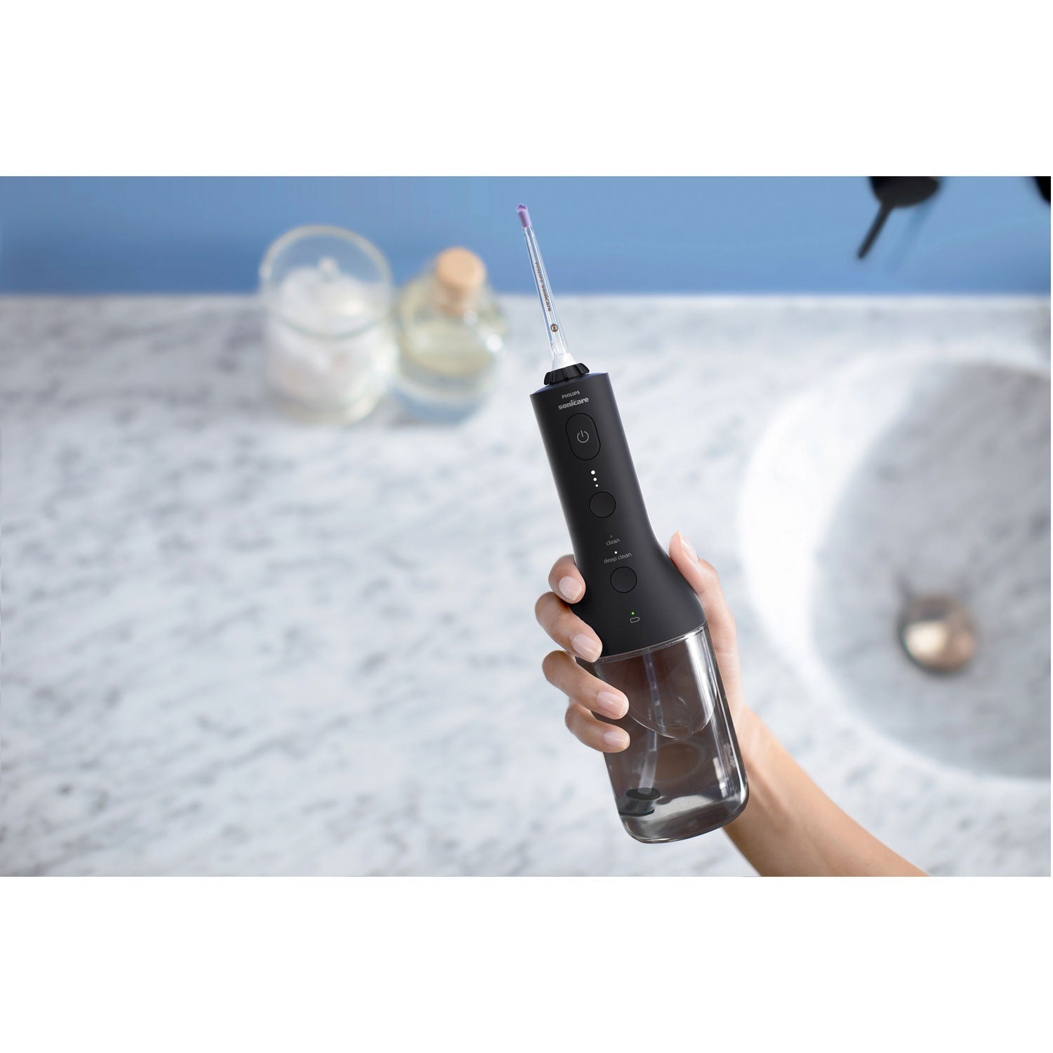 Power Flosser Mundusch QuadStream technology HX3826