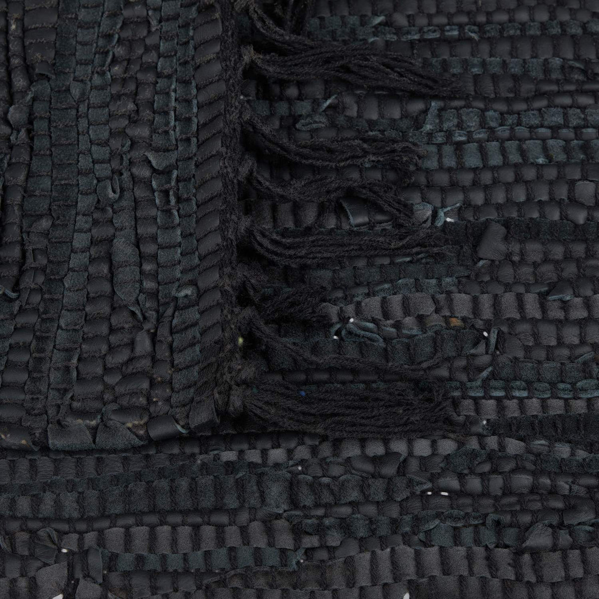 Rag rug in leather and cotton