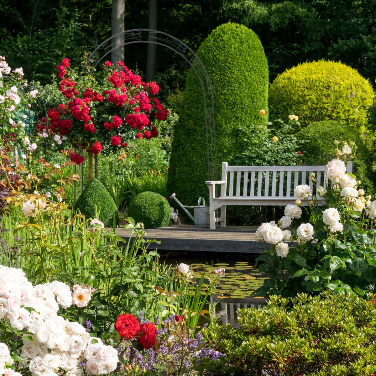 Rose arch with supporting ornaments