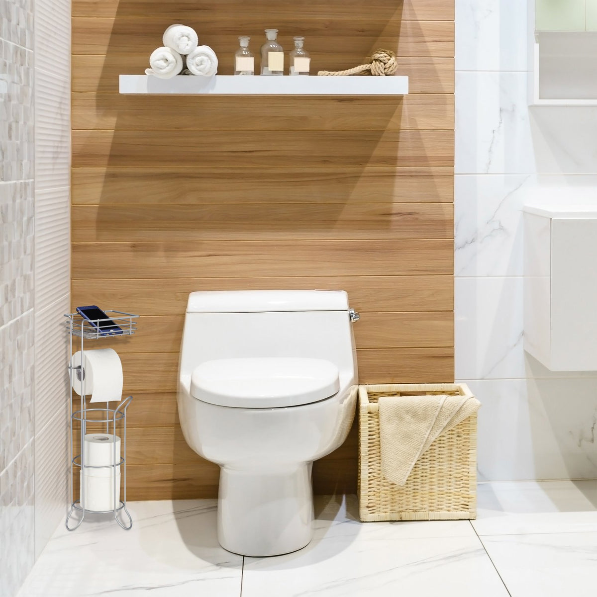 Silver toilet paper holder standing