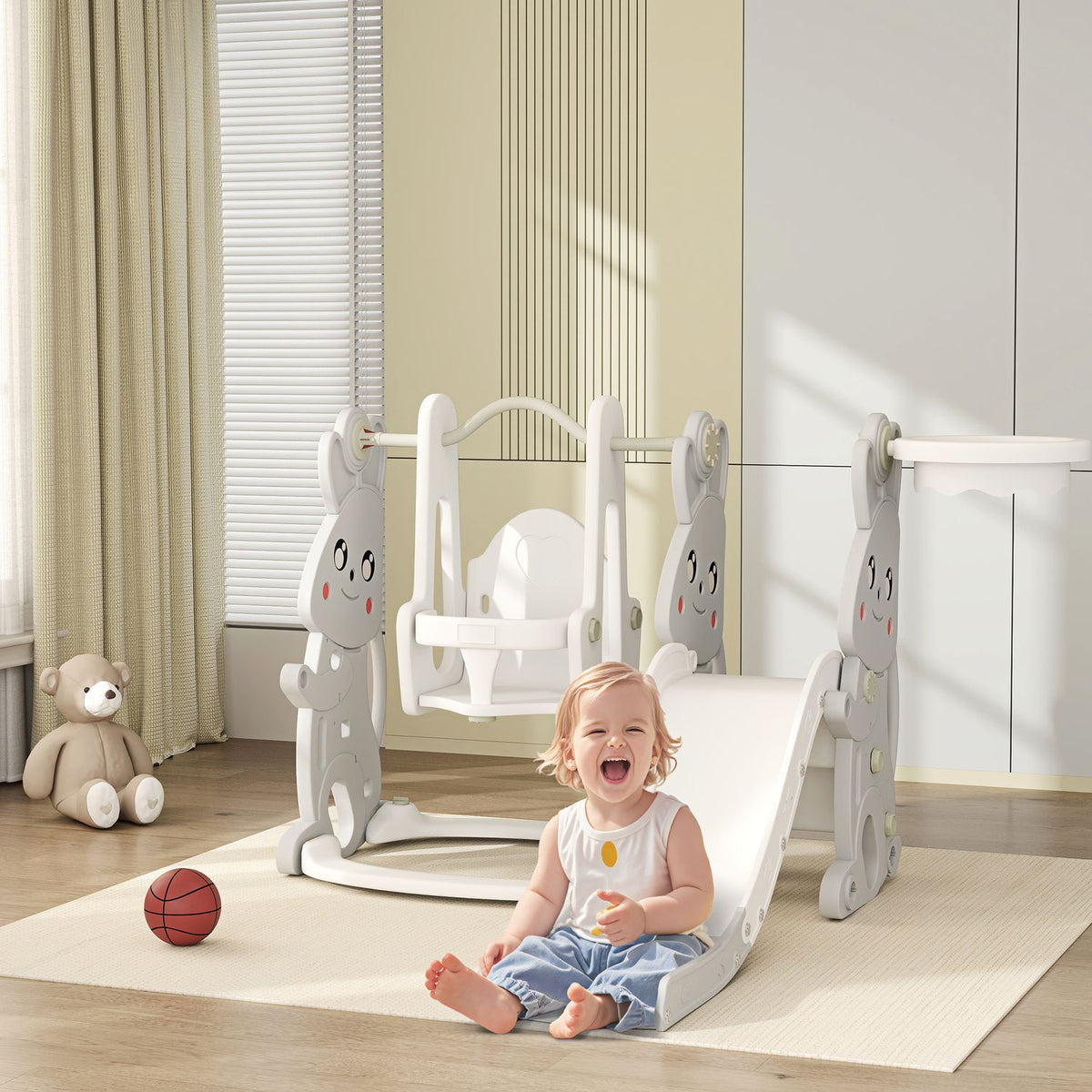 Slide 4-in-1 children's slide with swing, climbing frame, basketball hoop, children's playground with rabbit design, toddler slide for indoor and outdoor children aged 1.5-4 years. Gray