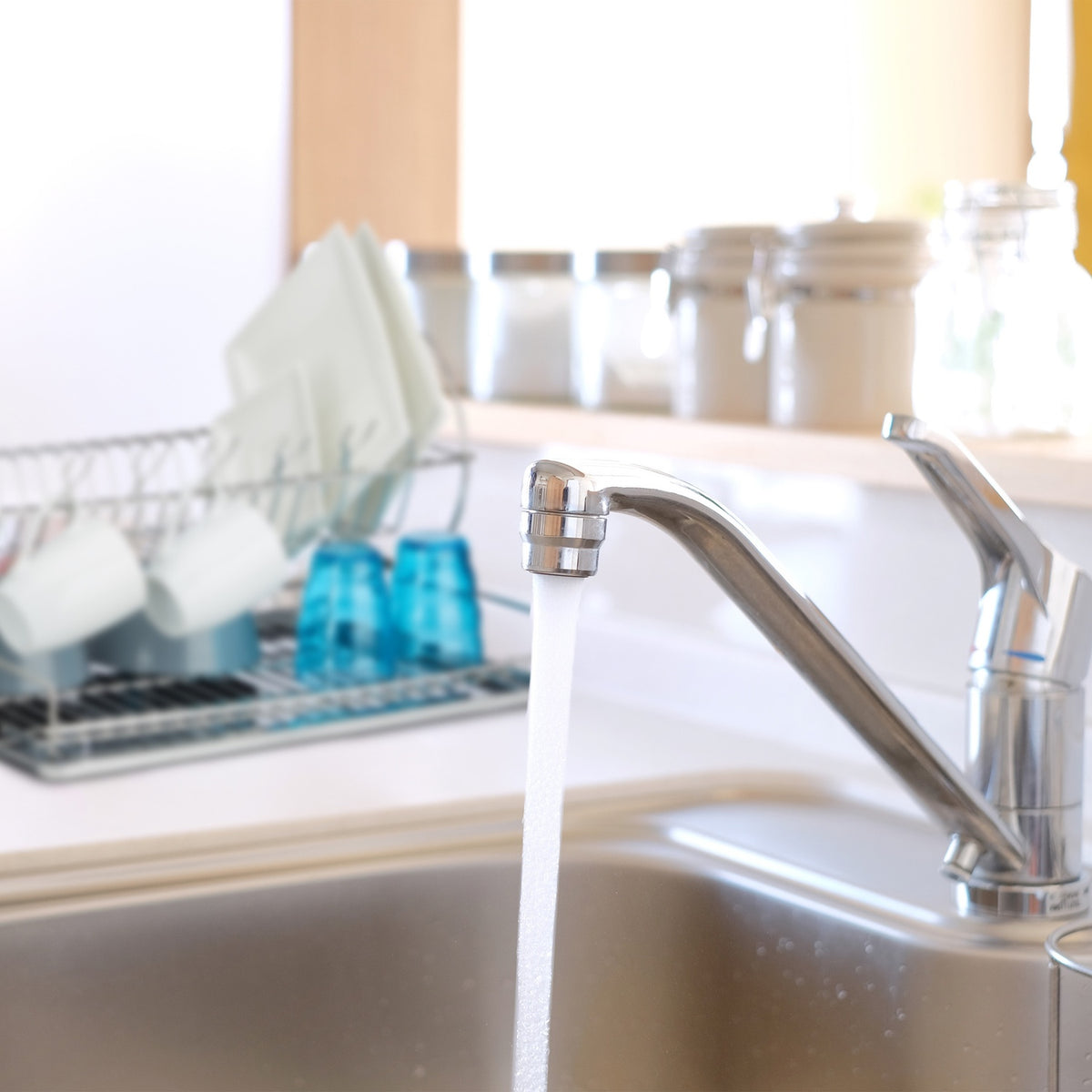 Stainless steel dish rack with glass holder