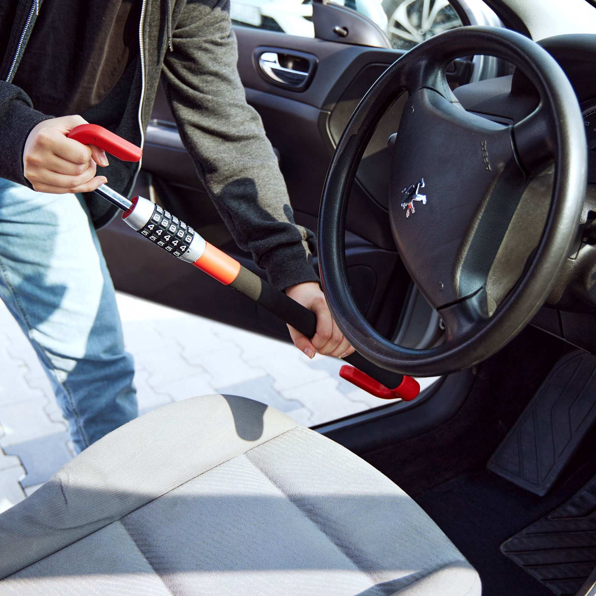 Steering wheel lock with number combination