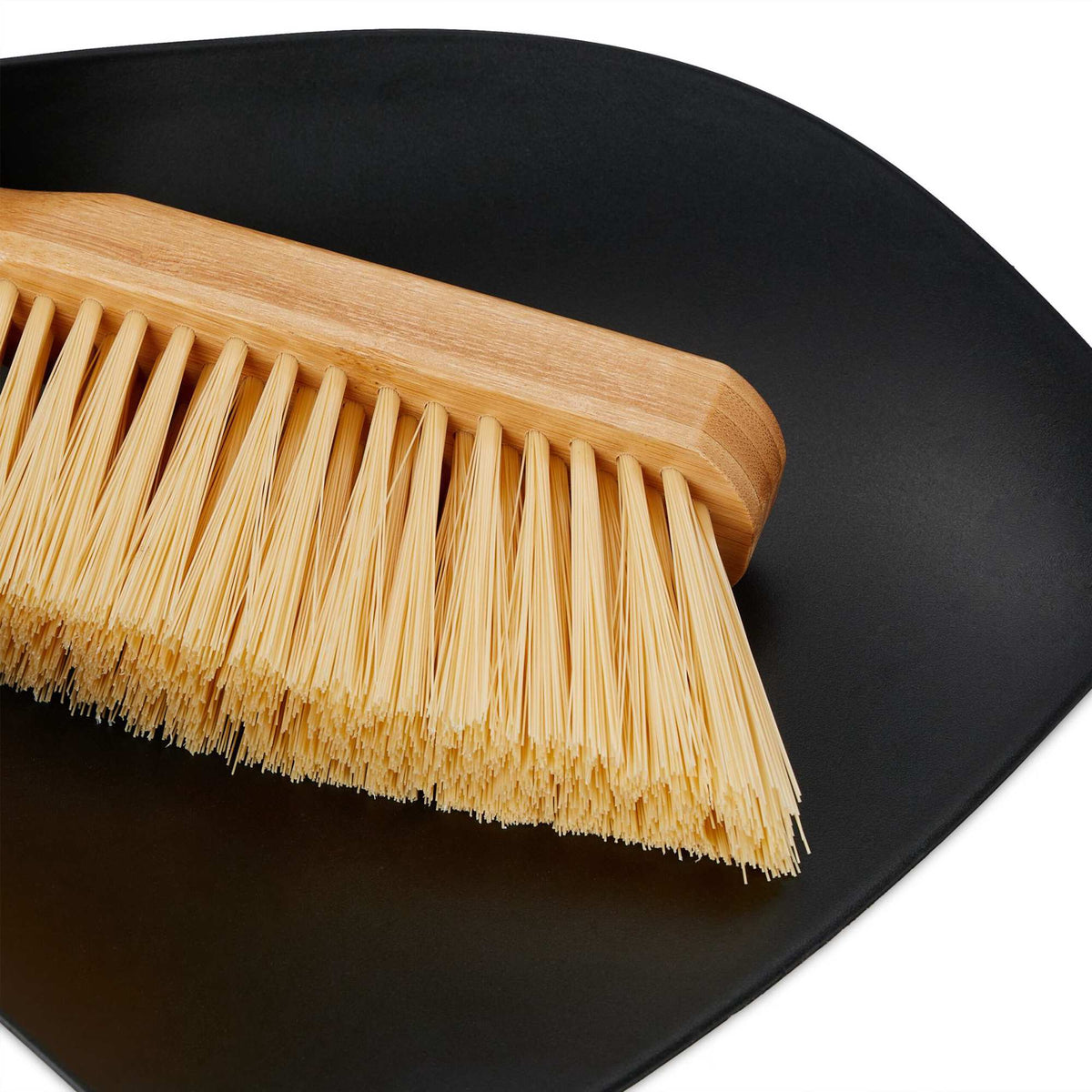 The mop consisting of a shovel and a broom