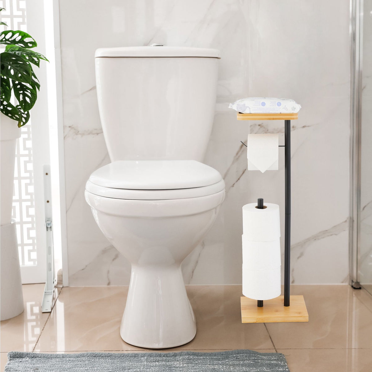 Toilet paper holder with space