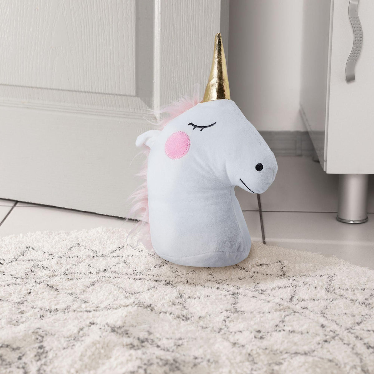 Unicorn door stop in white