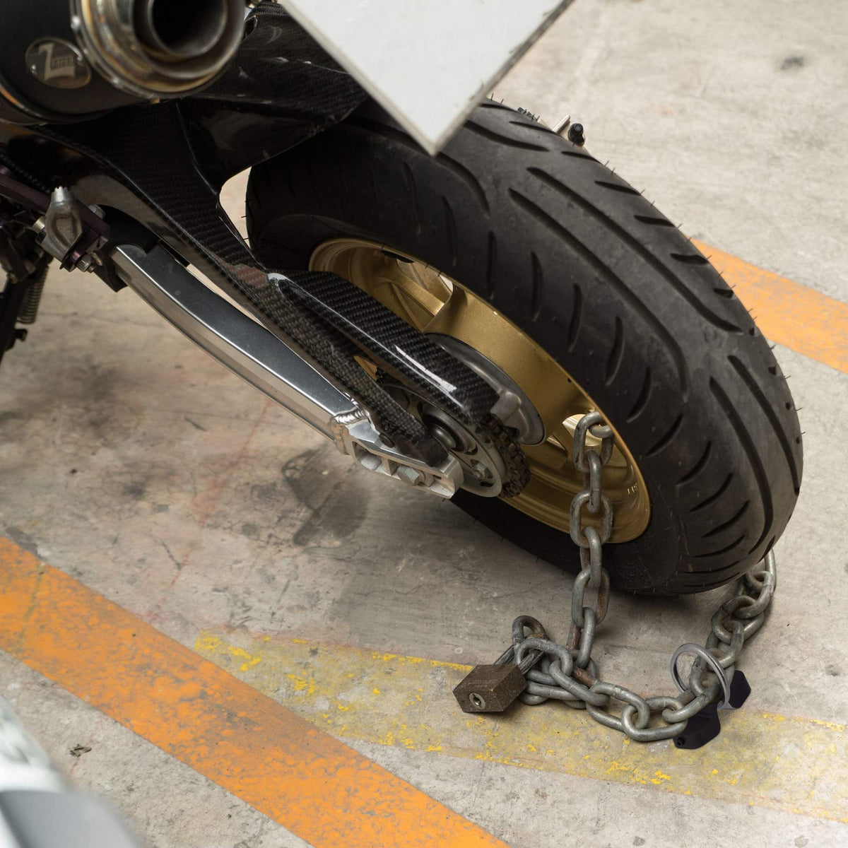 Wall and floor anchorage for bicycle