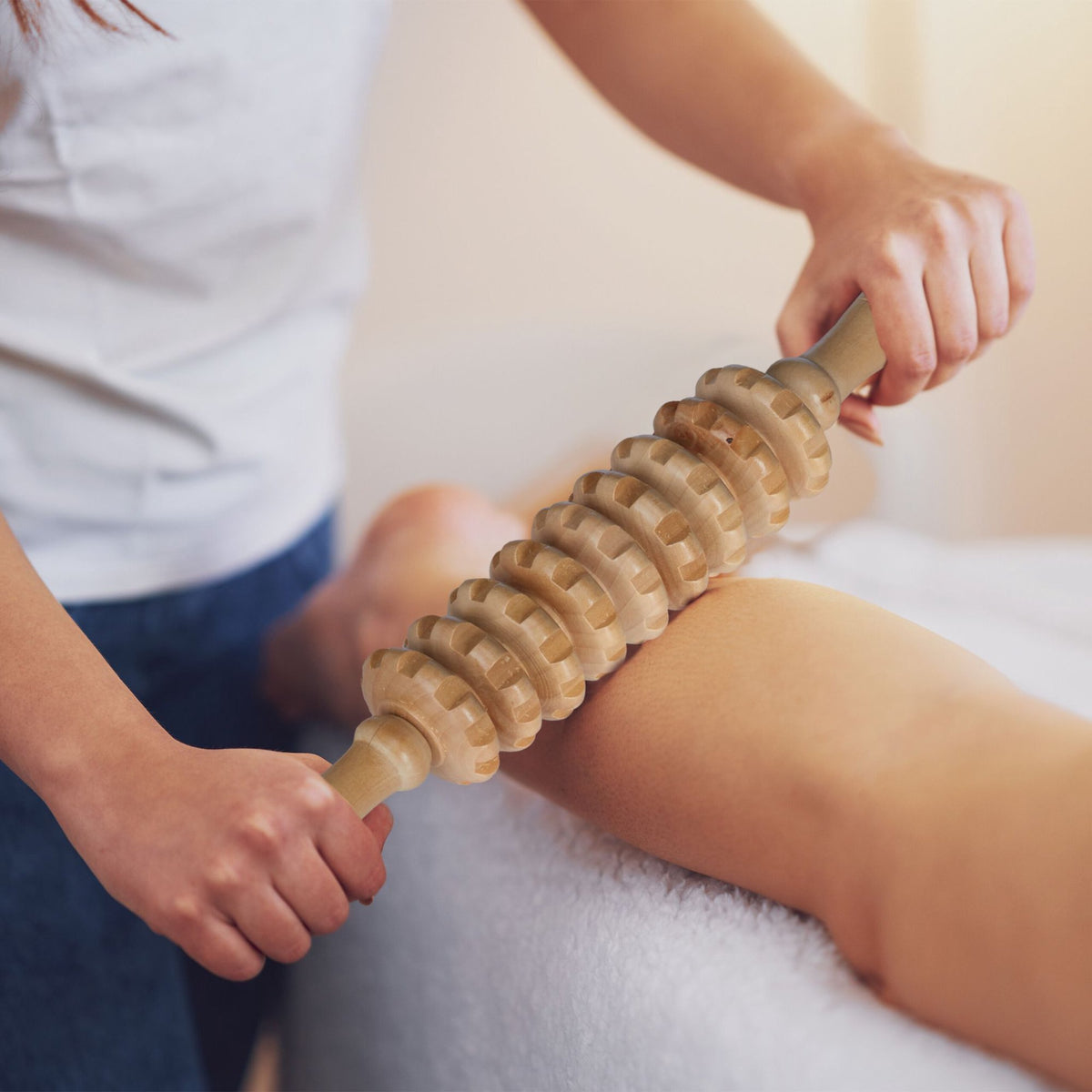 Wooden massage roller